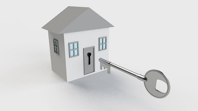Imagen de una casa con una llave